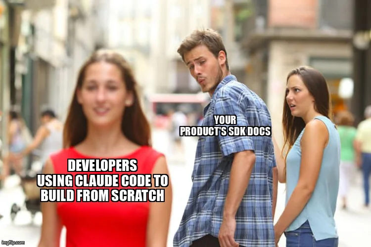 Distracted Boyfriend meme: the boyfriend labeled "developers using Claude Code to build from scratch" turns away from his girlfriend labeled "your product's SDK docs"